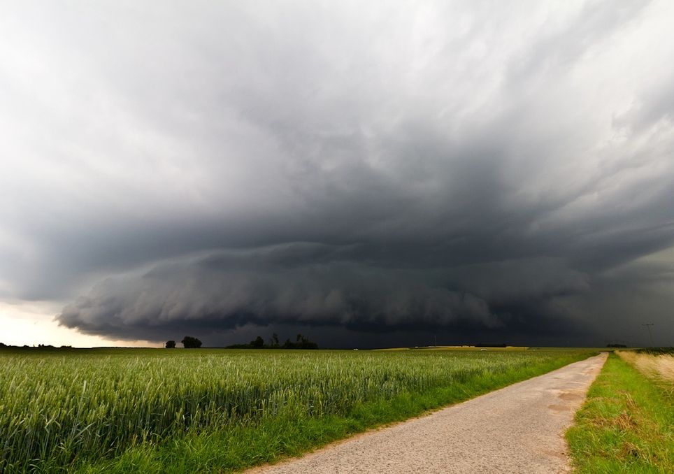 Supercell thunderstorm with low hanging wall cloud. Such storms are often associated with hail and severe weather.