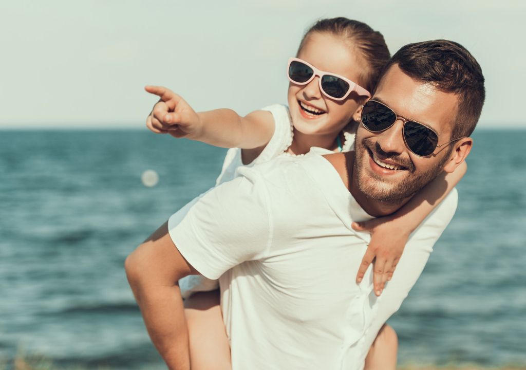 Father and daughter in sunglasses