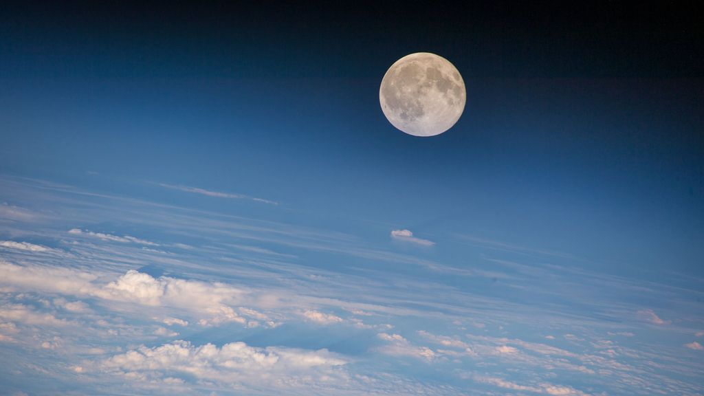 Image of a full moon above the clouds, image for illustration only. NASA.