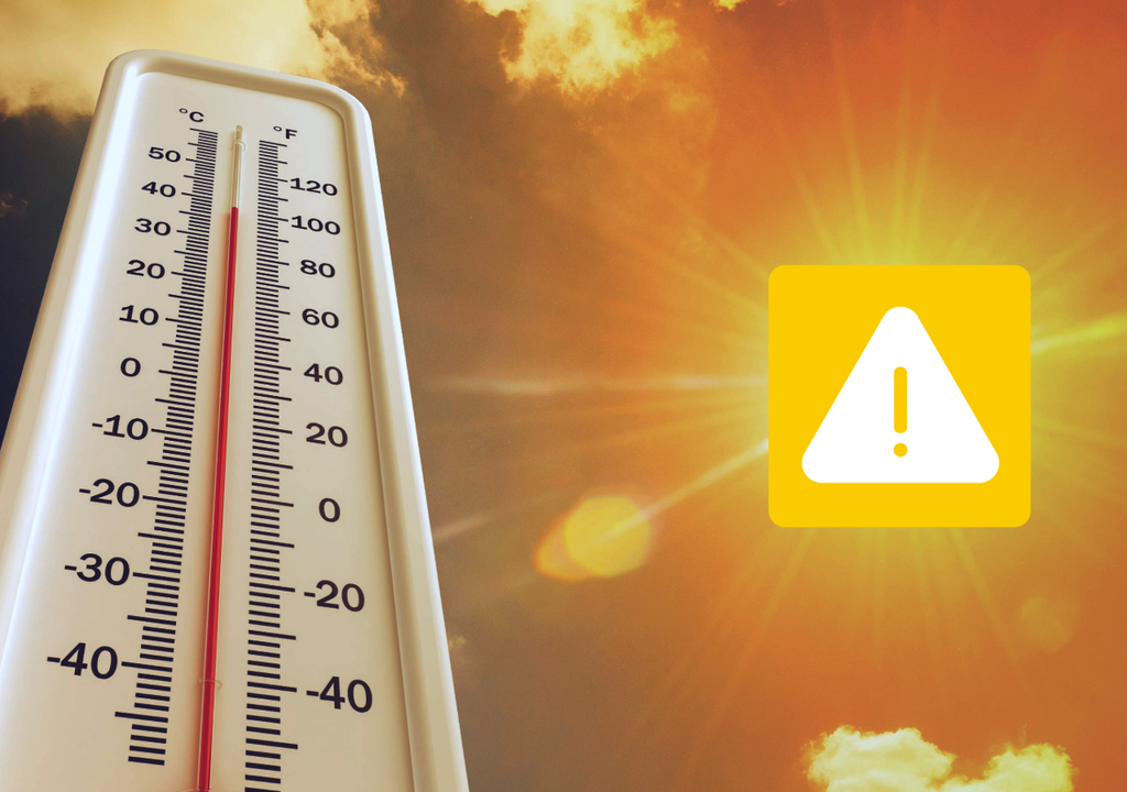 termómetro y símbolo de aviso termómetro y símbolo de aviso