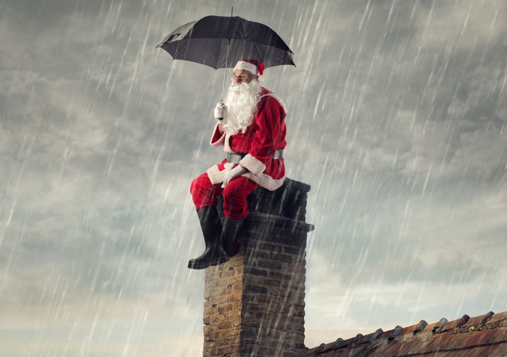 Papá Noel Navidad Nochebuena tiempo lluvias