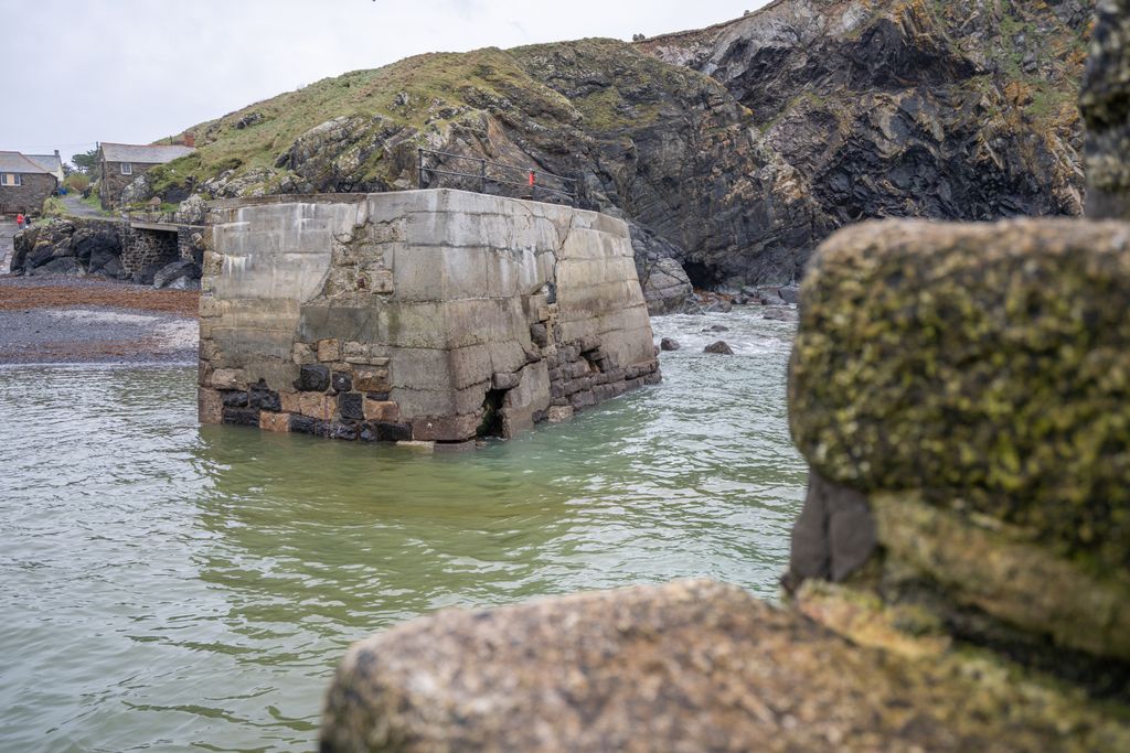 Damage to Mullion harbour walls from storm Ciaran (c) National Trust, Lewis Jeffries