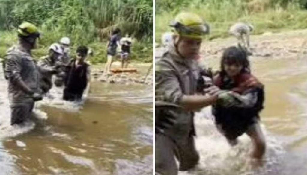 Bombeiros utilizam técnica de corrente humana para salvar adolescentes que ficaram isolados em Goiânia. Foto: Reprodução/TV Anhanguera