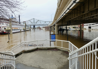 Climate change creeping into the back yards of Ohio's communities is a warning to the world