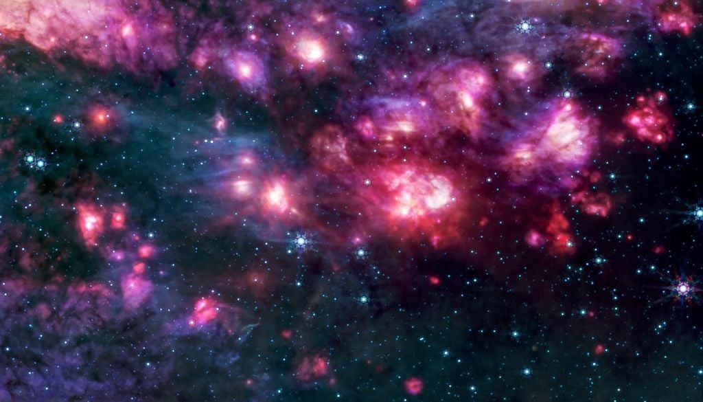 Webb revela con MIRI polvo brillante y estrellas jóvenes en Sagittarius B2, la región de formación estelar más activa. Crédito: NASA, ESA, CSA, STScI.