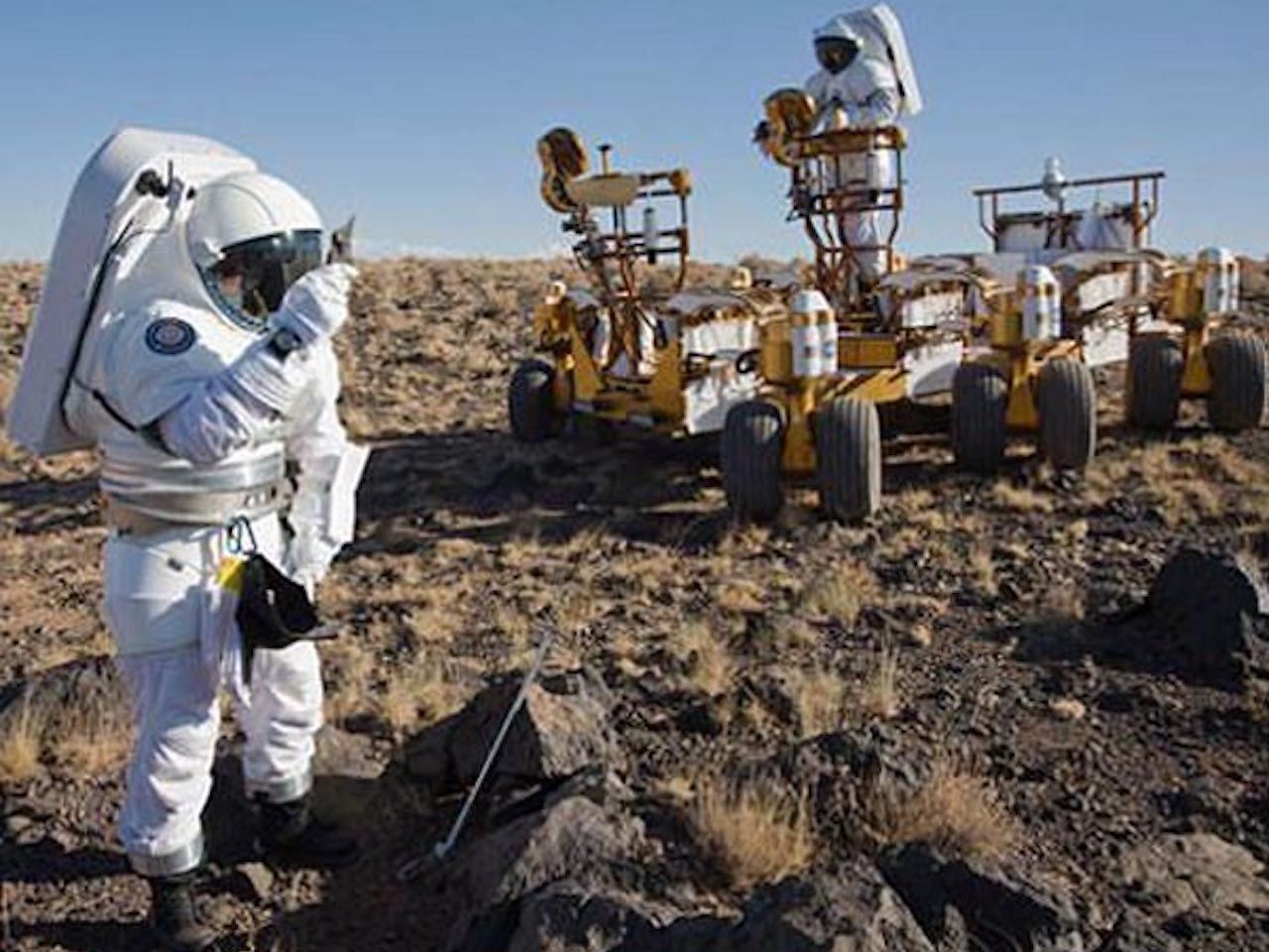 Concepción artística de astronautas trabajando en Marte. Crédito: spacedaily