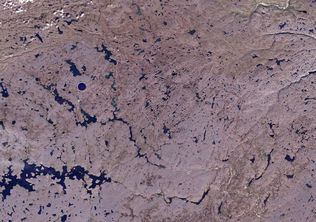 History of the perfectly symmetrical crater lying in the Arctic