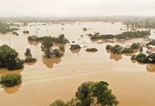 Historic floods hit Australia, at least 9 dead