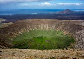 This giant volcanic caldera with a diameter of 1200 meters emerges from the volcanic sea in the Canary Islands.
