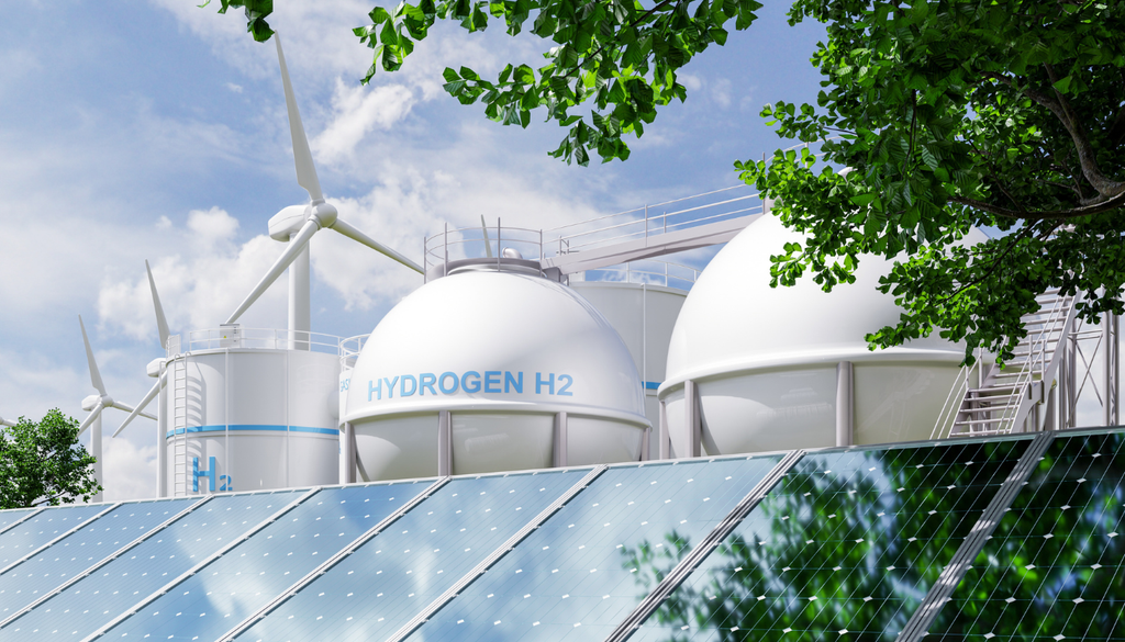 Producción de hidrógeno verde a partir de energías renovables: paneles solares y aerogeneradores alimentan la electrólisis, generando un combustible limpio clave para la transición energética.