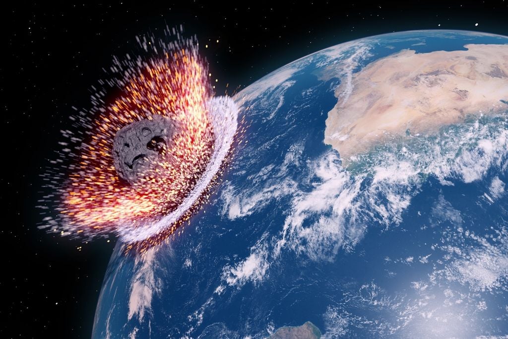 Imagen artística que muestra cómo debió ser el impacto del asteroide que cayó en lo que después sería la península de Yucatán.