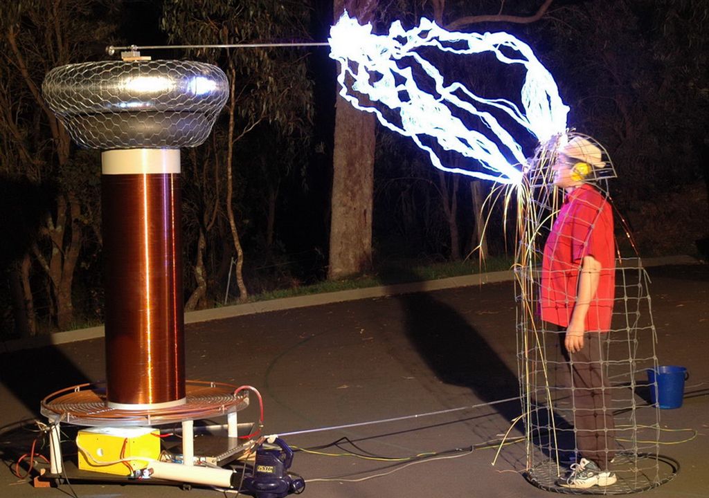 Faraday cage and Tesla coil