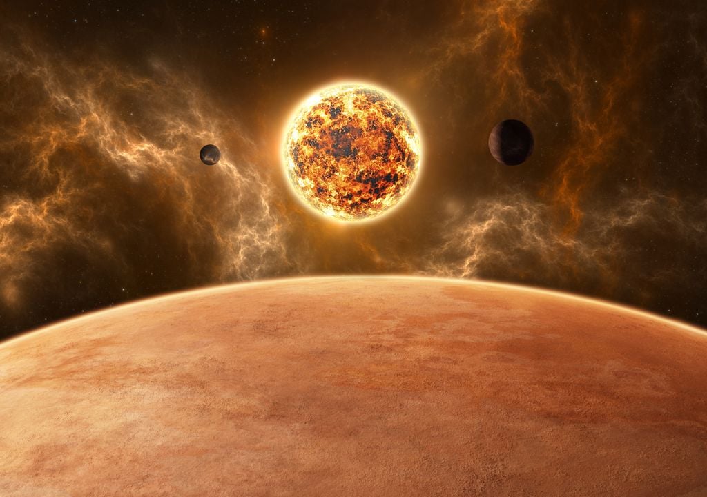 Représentation d'exoplanètes en orbite autour d'une naine rouge.