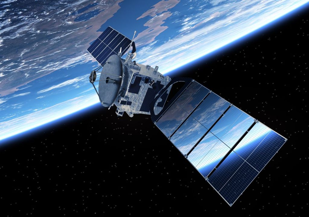 vista de un satélite en órbita, con la Tierra de fondo vista de un satélite en órbita, con la Tierra de fondo