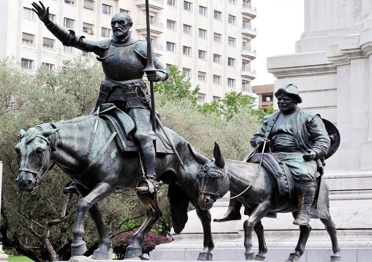 Estatua de Miguel de Cervantes en la plaza de España de Madrid, con Don Quijote de la Mancha y Sancho Panza. Estatua de Miguel de Cervantes en la plaza de España de Madrid, con Don Quijote de la Mancha y Sancho Panza.