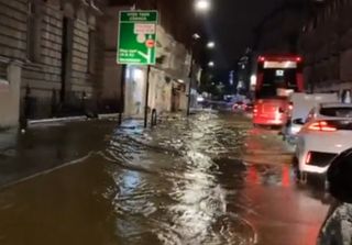 Flooding causes London travel chaos after torrential rain