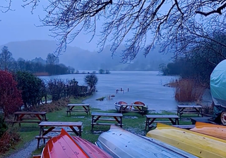 Flood waters disrupt public spaces and properties as river levels rise in the UK