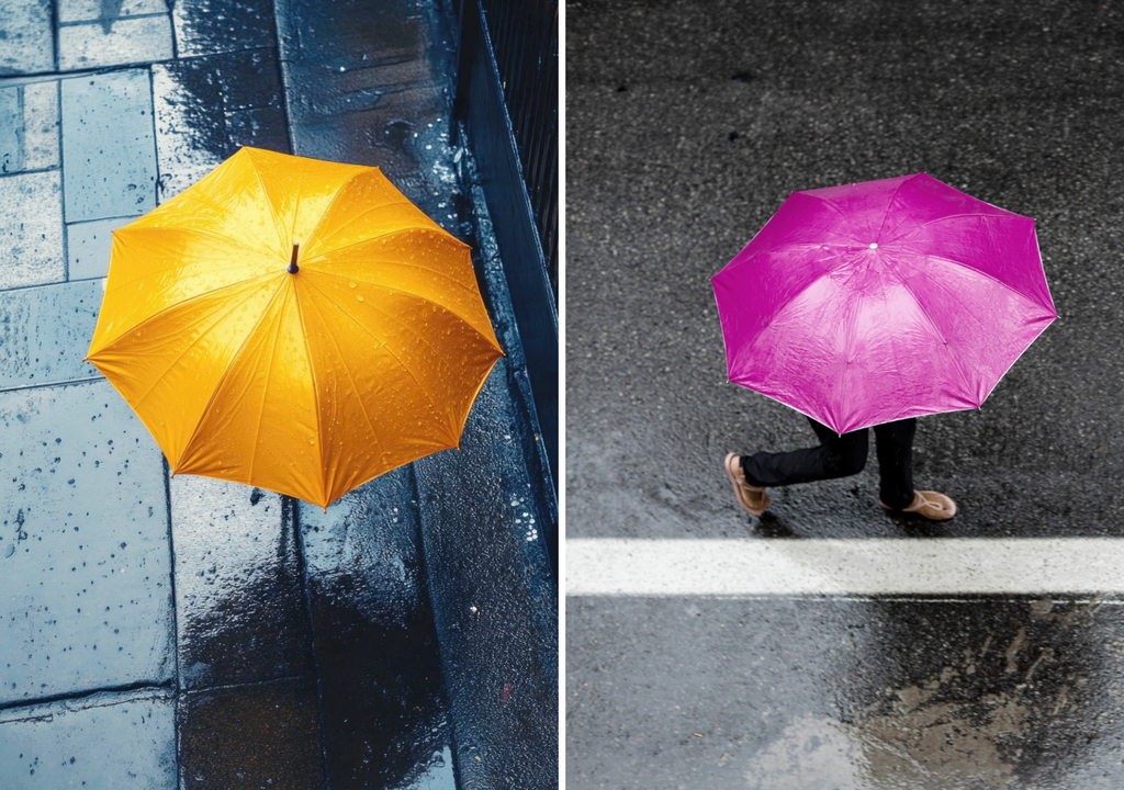 personas llevando paraguas