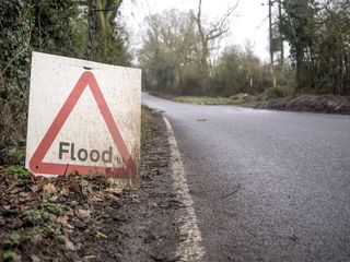 Heavy rain leads to flooding and disruption in Britain