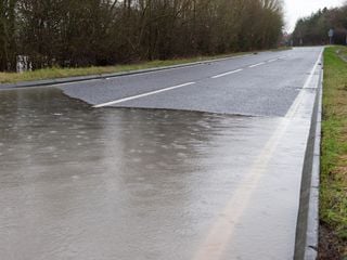 Heavy rain triggers mudslide and travel disruption