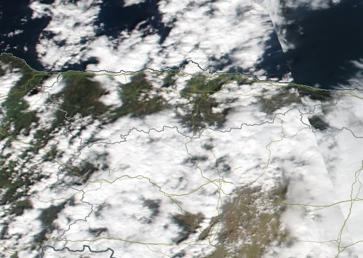 Imagen MODIS-Terra del 10 de marzo de 2018 al mediodía. Asturias, por ejemplo, aparece despejada con vientos de componente sur que recalientan y desecan el ambiente. NASA