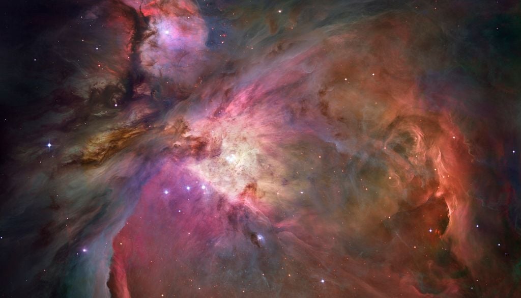 Eine Hubble-Aufnahme des Orionnebels, der im Sternbild Orion sogar mit bloßem Auge erkennbar ist. Nördlich davon liegt das Sternentstehungsgebiet OMC-2. Eine Hubble-Aufnahme des Orionnebels, der im Sternbild Orion sogar mit bloßem Auge erkennbar ist. Nördlich davon liegt das Sternentstehungsgebiet OMC-2. Bild: NASA/ESA/M. Robberto/Hubble Space Telescope Orion Treasury Project