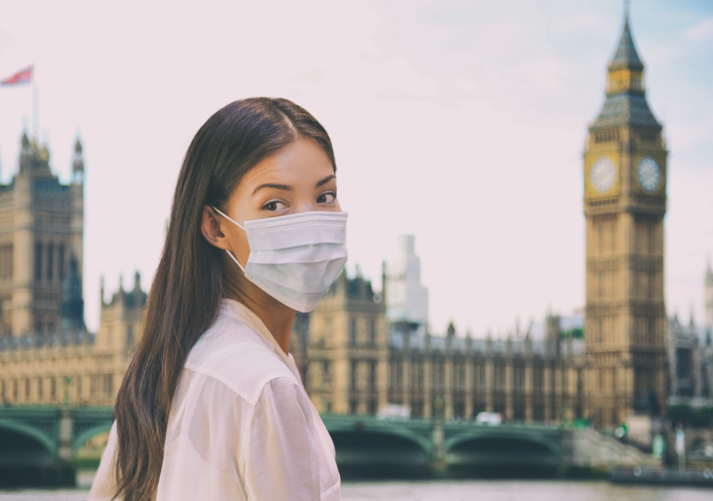 Young person in London wearing face mask.