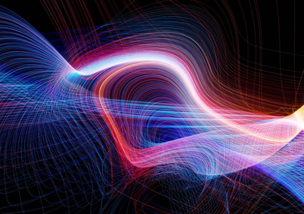 Según esta teoría, la frecuencia con la que vibra la cuerda determina las propiedades de cada partícula.