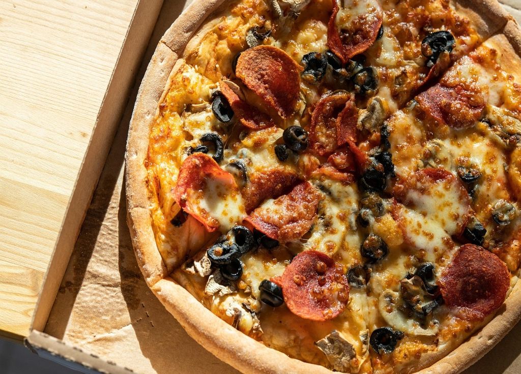 Une pizza de temps en temps peut s'intégrer dans une alimentation équilibrée Une pizza de temps en temps peut s'intégrer dans une alimentation équilibrée