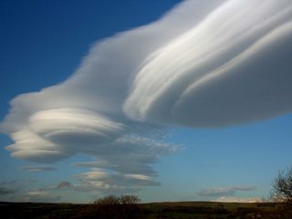 Impressive lenticular cloud over the Popocatépetl volcano, Mexico