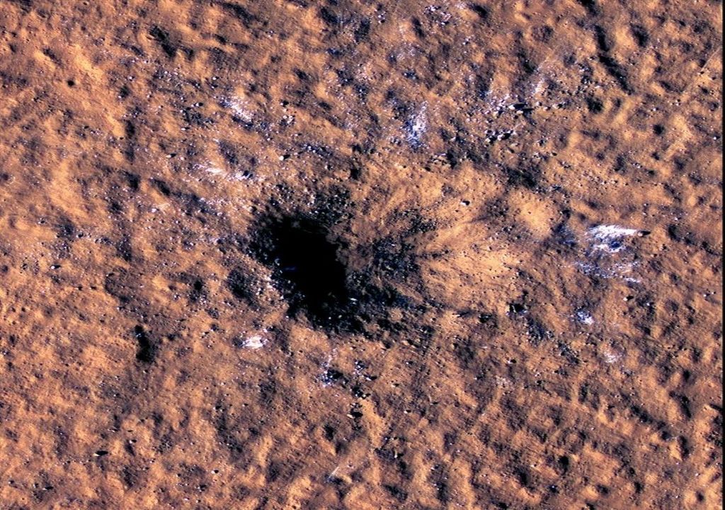 Massive meteoroid impact on Mars