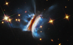 Hubble observa el caos extremo dentro de “el Chivito de Drácula”: el mayor disco protoplanetario jamás observado