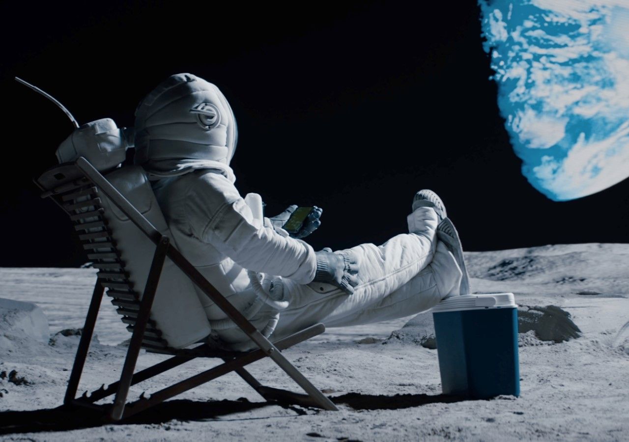 astronaut chilling on the moon