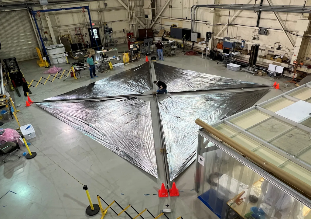 Engineers at NASA’s Langley Research Center test deployment of the Advanced Composite Solar Sail System’s solar sail. Credit: NASA