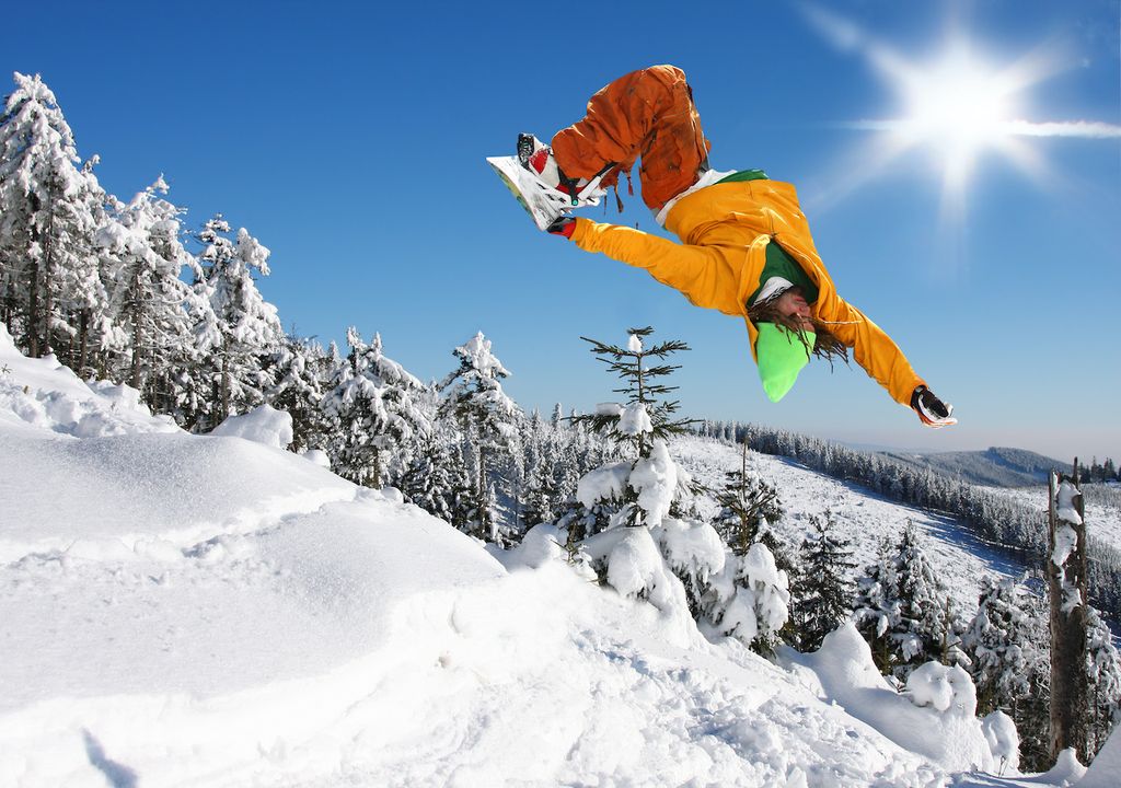 Snow sports on snowpack with snowboarder.