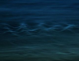 Nubes noctilucentes onduladas
