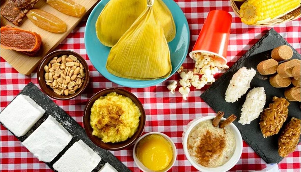 Algumas das comidas típicas das festas juninas. Boa parte dos pratos é feita com milho. Crédito: Divulgação.