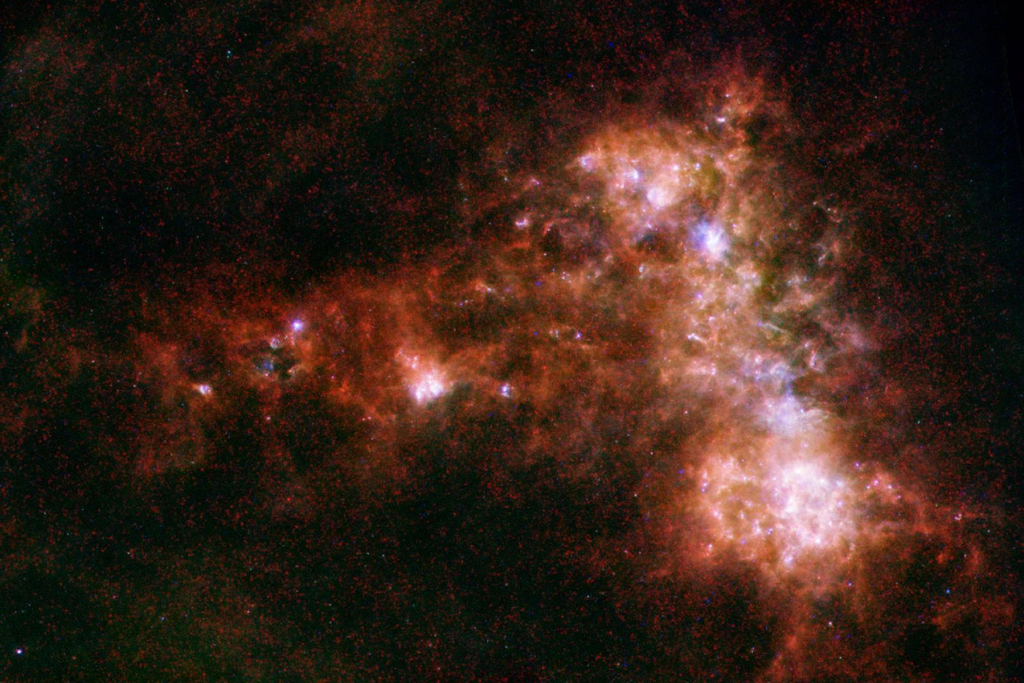 Pequena Nuvem de Magalhães pode ter um buraco negro supermassivo que estava escondido esse tempo todo e finalmente foi encontrado. Crédito: NASA