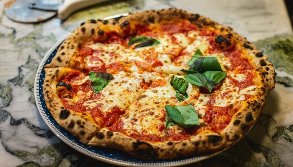pizza margarita Un buen maridaje para la pizza Margarita es un tinto liviano y frutal. Imagen: Aurelien Lemasson