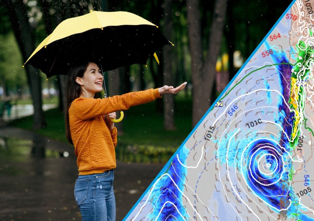 persona con su brazo extendido para recibir gotas de lluvia. La imagen del modelo con un sistema frontal sobre Chile central está a su frente.