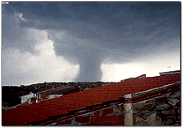 FIG. 4 El Tornado visto desde Mazaleón a 15 UTC aprox. FIG. 4 El Tornado visto desde Mazaleón a 15 UTC aprox.