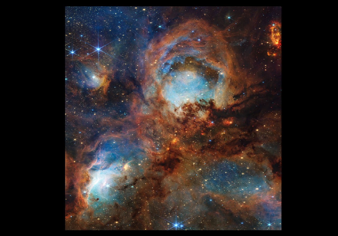 La nebulosa NGC 6334, nota anche come "zampa di gatto" nell'immagine infrarossa del James Webb. Credit: NASA, ESA, CSA, STScI