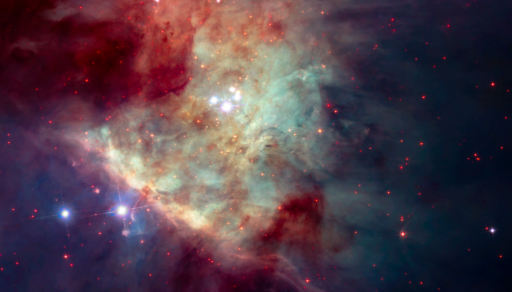 Die Orion-Leiste (Orion Bar) ist eine diagonale, gratenartige Struktur aus Gas und Staub im unteren linken Quadranten des Orionnebels. Sie wird durch die intensive Strahlung nahegelegener heißer, junger Sterne geformt. Bild: NASA/ESA/STScI/Hubble Space Telescope Orion Treasury Project Team
