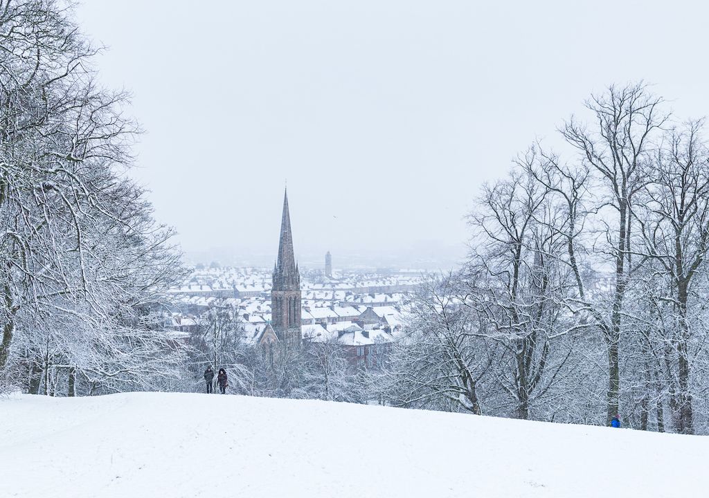 Glasgow awoke to snowfall with the arrival of a weather system from the Atlantic feared to be Storm Henk, and weather warnings sweeping the UK.