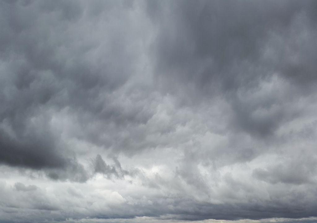 The UK is currently experiencing a phenomenon known as an anticyclonic gloom bringing cloudy skies and limited brightness.