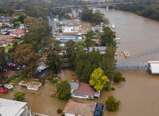 Thousands evacuated in Sydney as 28 inches of rain fall in four days