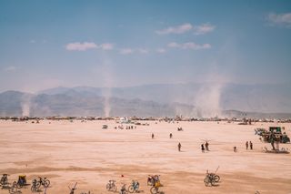 Thousands Trapped by Flooding in the Dangerous Sands at Burning Man Finally Able to Escape the Playa