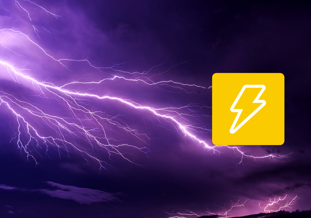 imagen de tormenta eléctrica y símbolo de advertencia