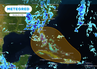 Tropical disturbance has 50% chance of tropical development near the Greater Antilles and Bahamas, NHC says