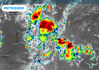 Tropical disturbance near the Western Caribbean shows potential for development, models split on future path